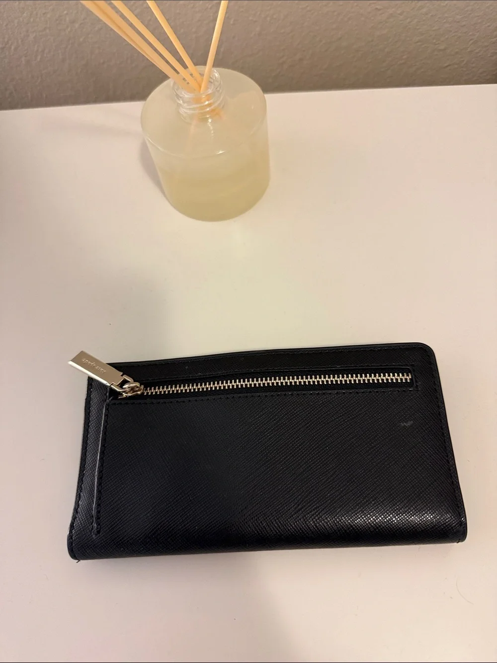 kate spade black zip-around continental wallet with gold logo